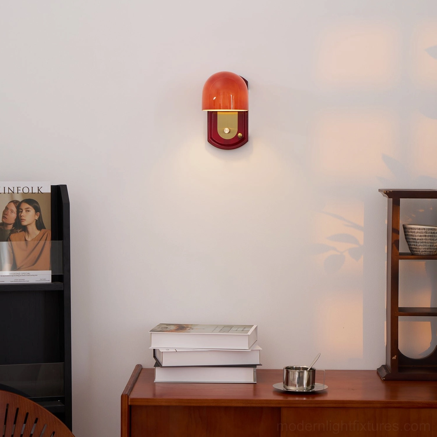 Lolita wall sconce installed in Scandinavian minimalist bedroom with natural wood and soft neutral palette
