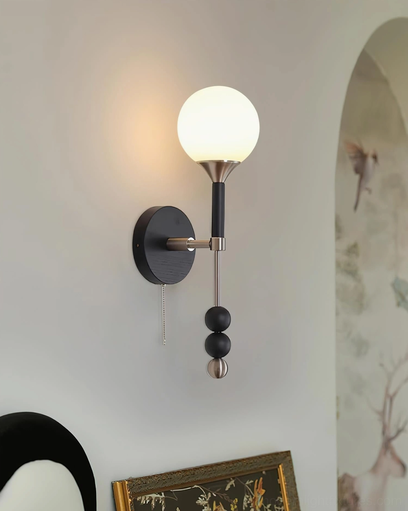 Lolli geometric wall sconce with frosted glass shade and bold metal sphere details