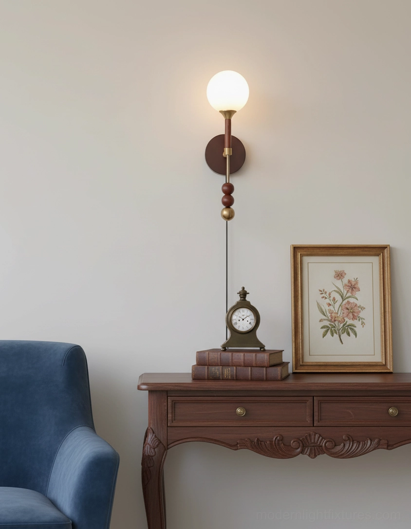 Lolli modern wall lamp with sculptural metal spheres and frosted glass dome shade