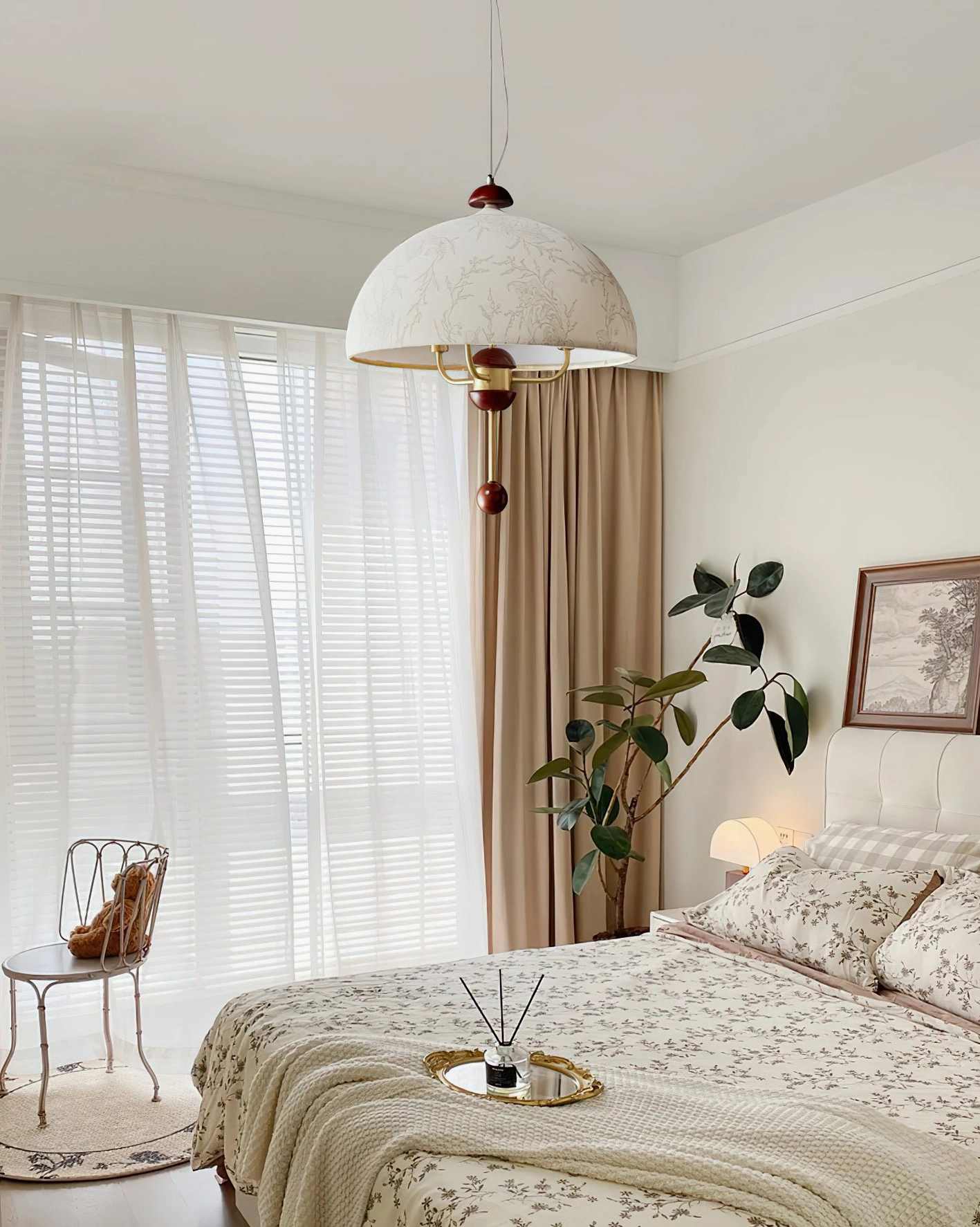 Lonzo fabric dome pendant light in cozy cottage bedroom with floral bedding and vintage warm interior design style