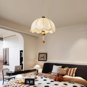 Lonzo scalloped fabric pendant light hanging in contemporary bedroom with study area, warm neutral vintage decor and soft ambient lighting