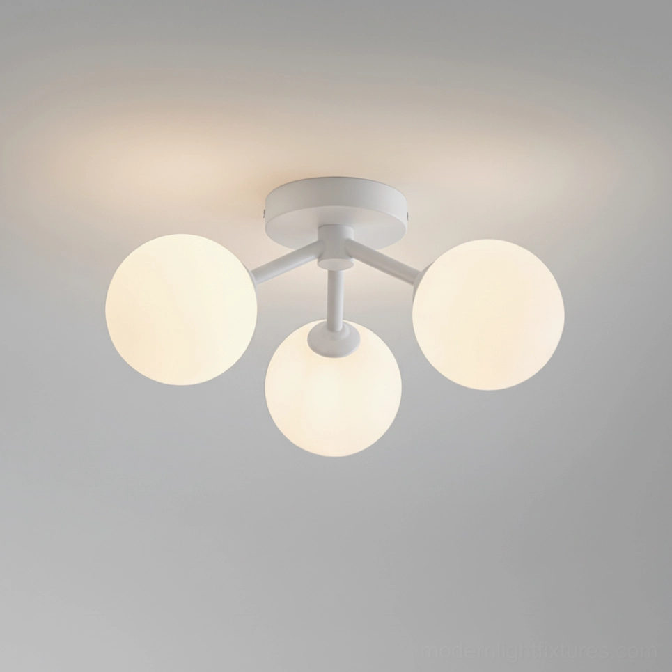 Lorelai flush mount ceiling light with frosted glass globes warm ambient lighting detail