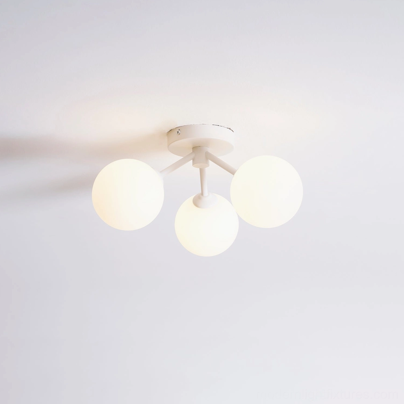Modern white three-globe ceiling light Lorelai minimalist Scandinavian fixture