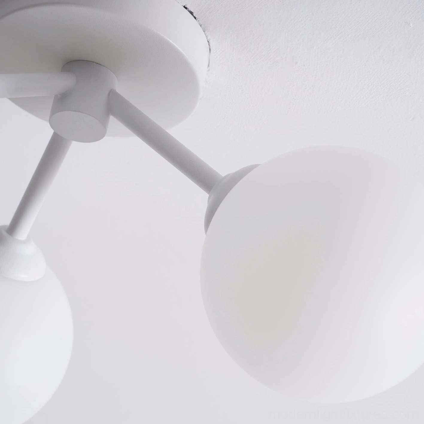 Three-globe flush ceiling light Lorelai white finish contemporary Nordic decor