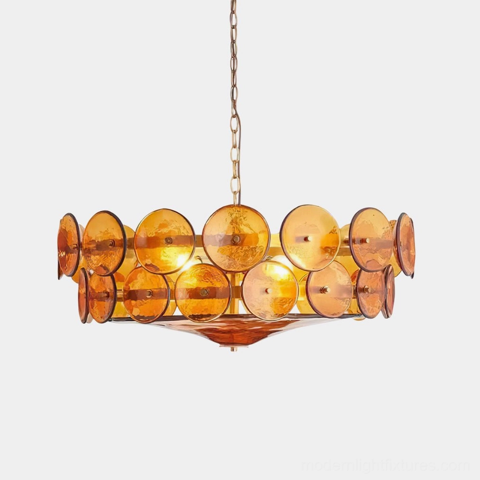 Lorenzo hand-cast glass chandelier close-up front view showing amber glass discs and brass hardware