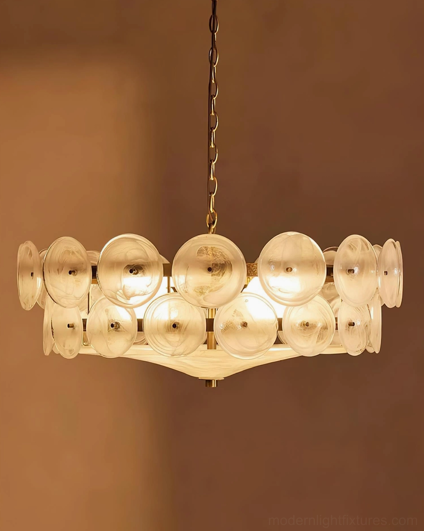 Lorenzo hand-cast glass chandelier dimmed atmospheric room mood lighting