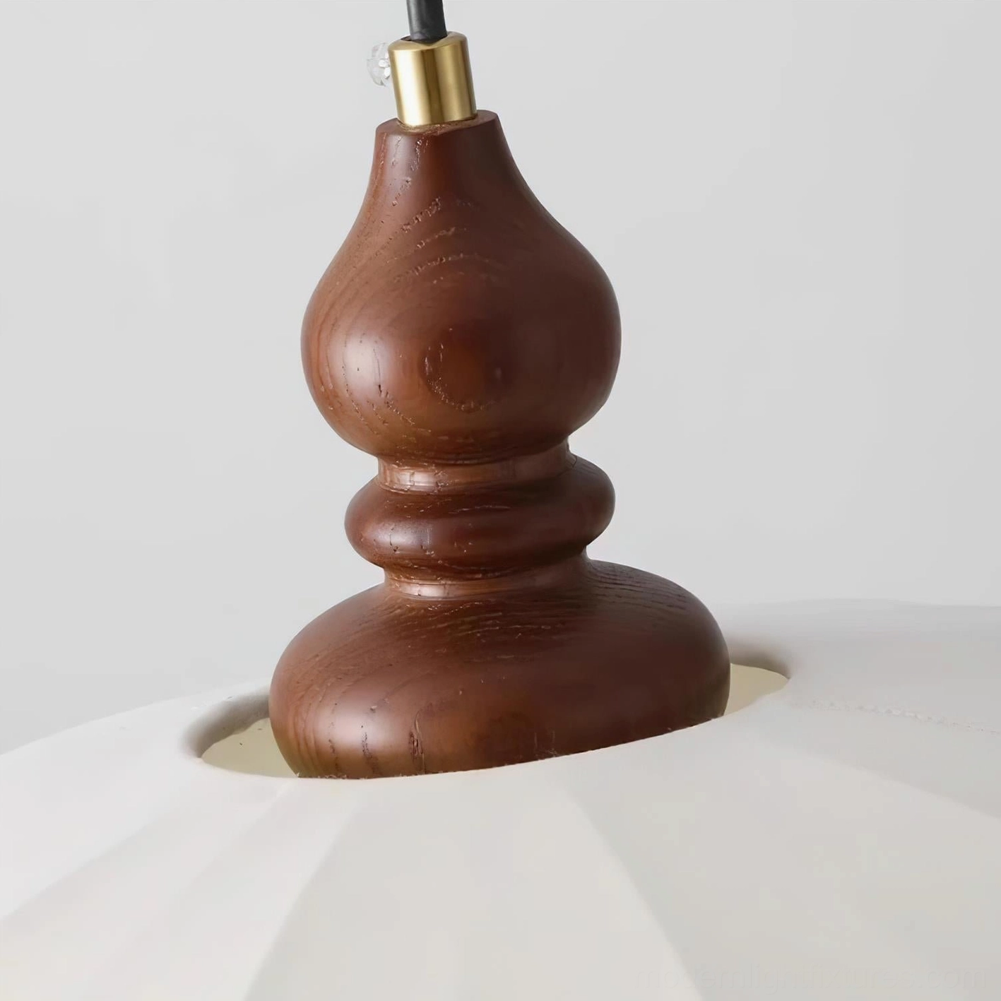 Lotus Belly pendant light walnut wood ceiling mount connector with brass metal joint component, close-up detail shot