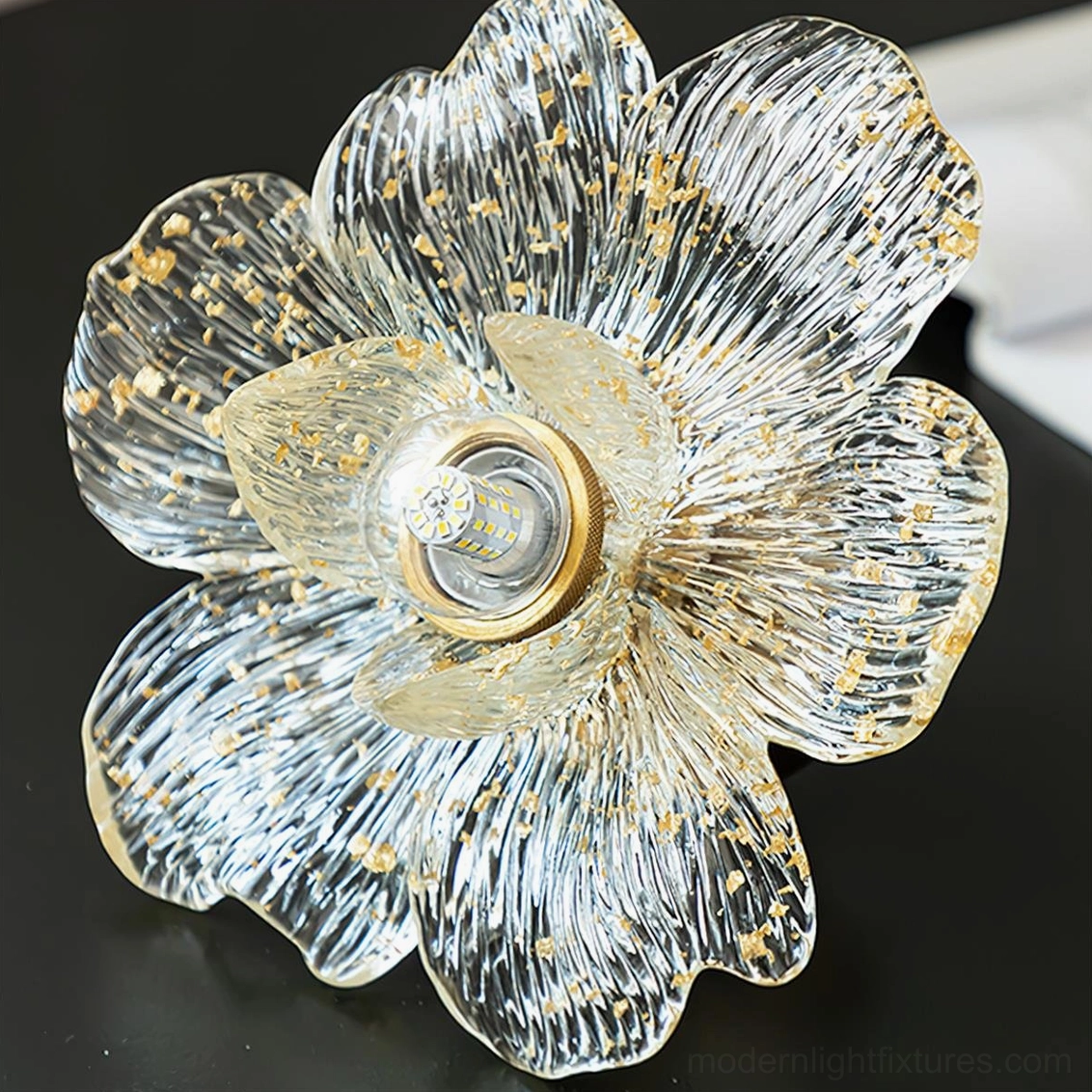 Macro photography of resin flower petal shade with gold foil and bulb socket