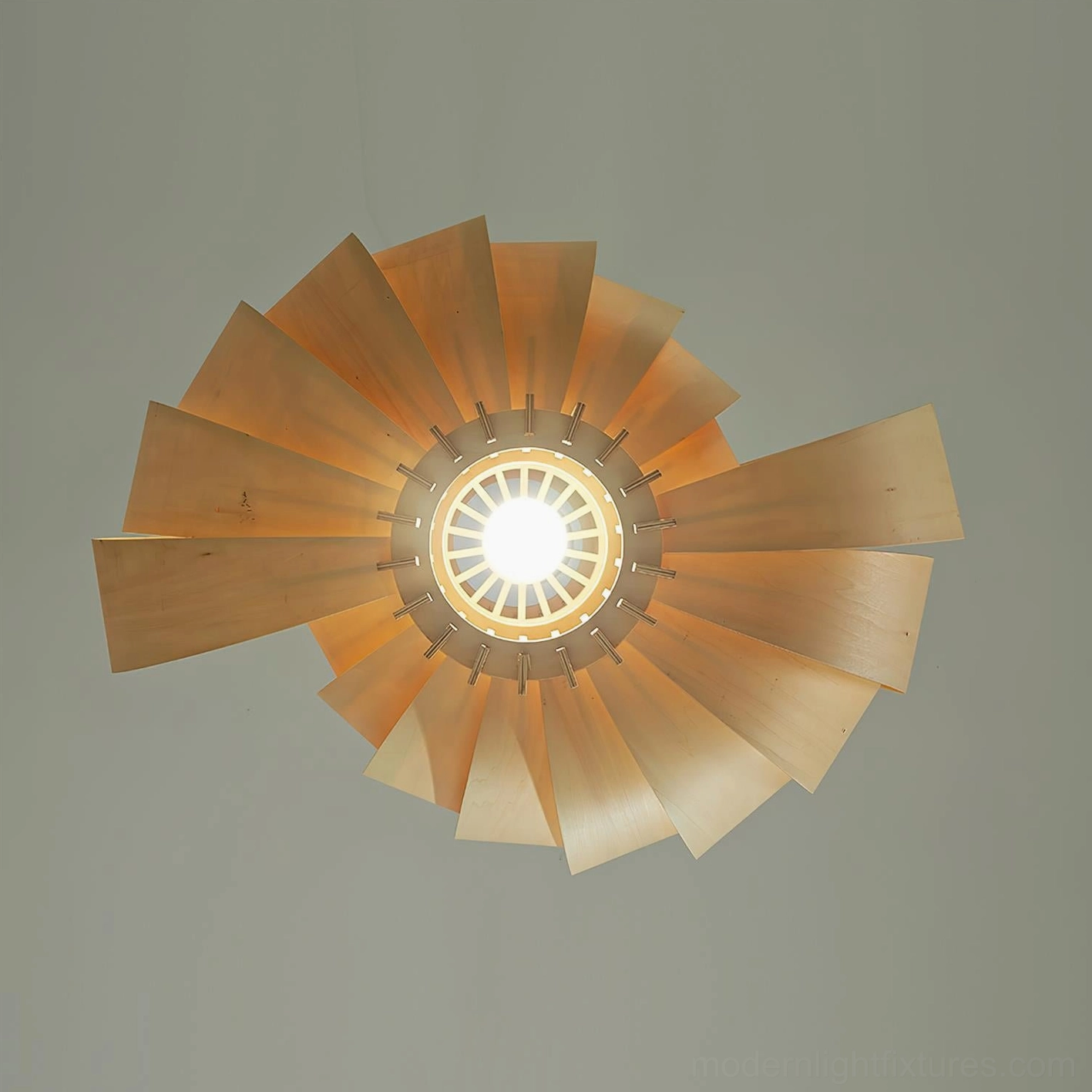 Walnut finish wooden sphere pendant light suspended in living room lounge area creating contemplative ambiance