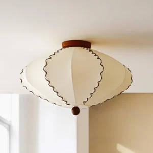 Walnut and beige scalloped ceiling light mounted on warm residential ceiling with natural light