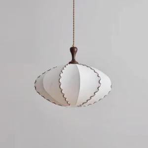Lucian vintage textile pendant lamp showing oval petal-shaped shade with dark wavy trim detail, side oblique angle