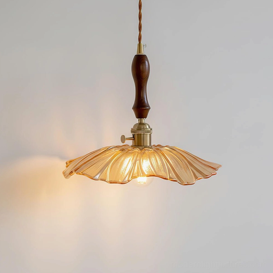 Amber hand-blown glass pendant lamp with rippled lotus shade, direct frontal view studio photo