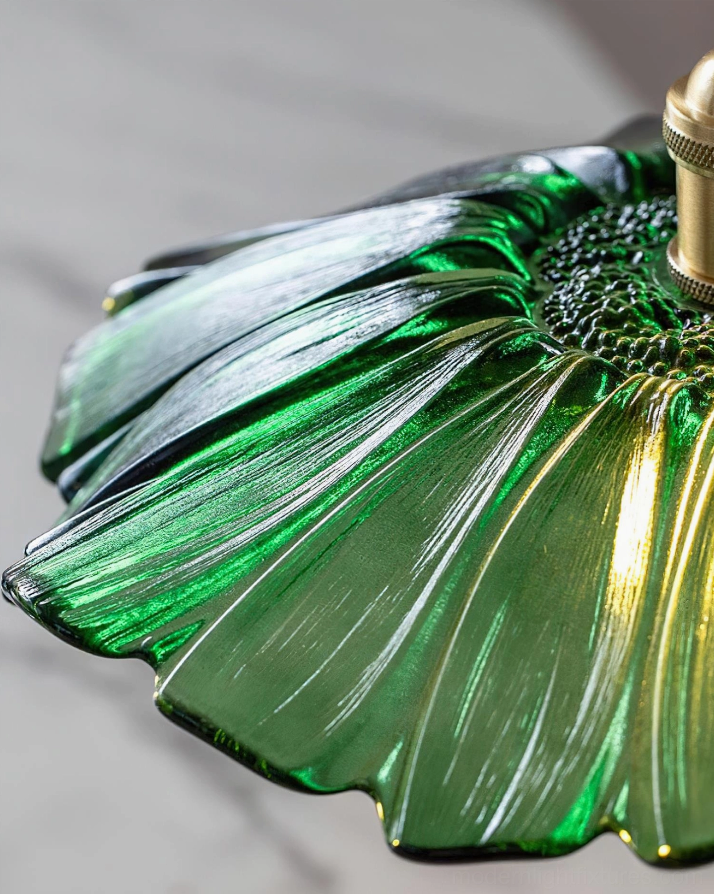 Artisanal glass pendant light with lotus silhouette, warm ambient lighting atmosphere