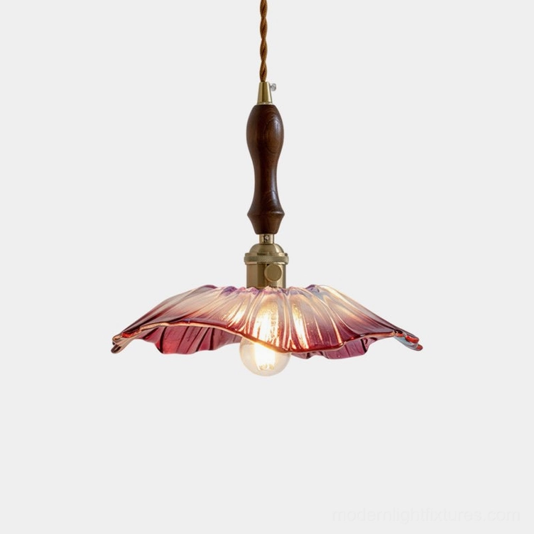 Lucira hand-blown glass pendant light with wine-red fluted lotus shade, brass and walnut accents, studio product photo