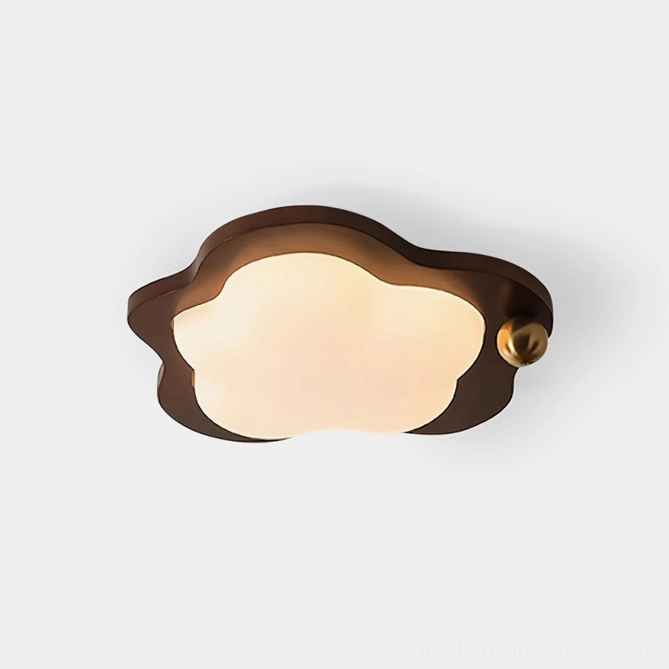 Lumi cloud ceiling light fixture with walnut wood frame and golden brass accent on white background