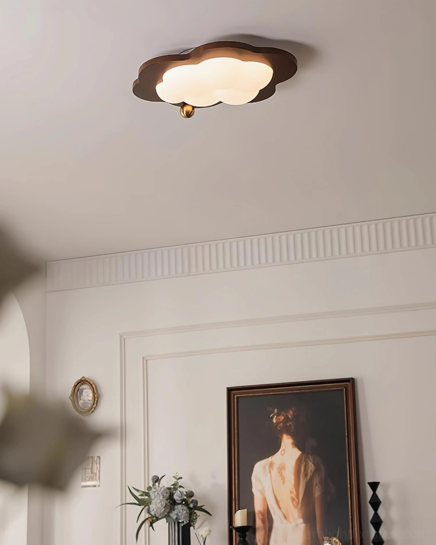 Glowing cloud ceiling light fixture in French vintage interior with warm ambient lighting