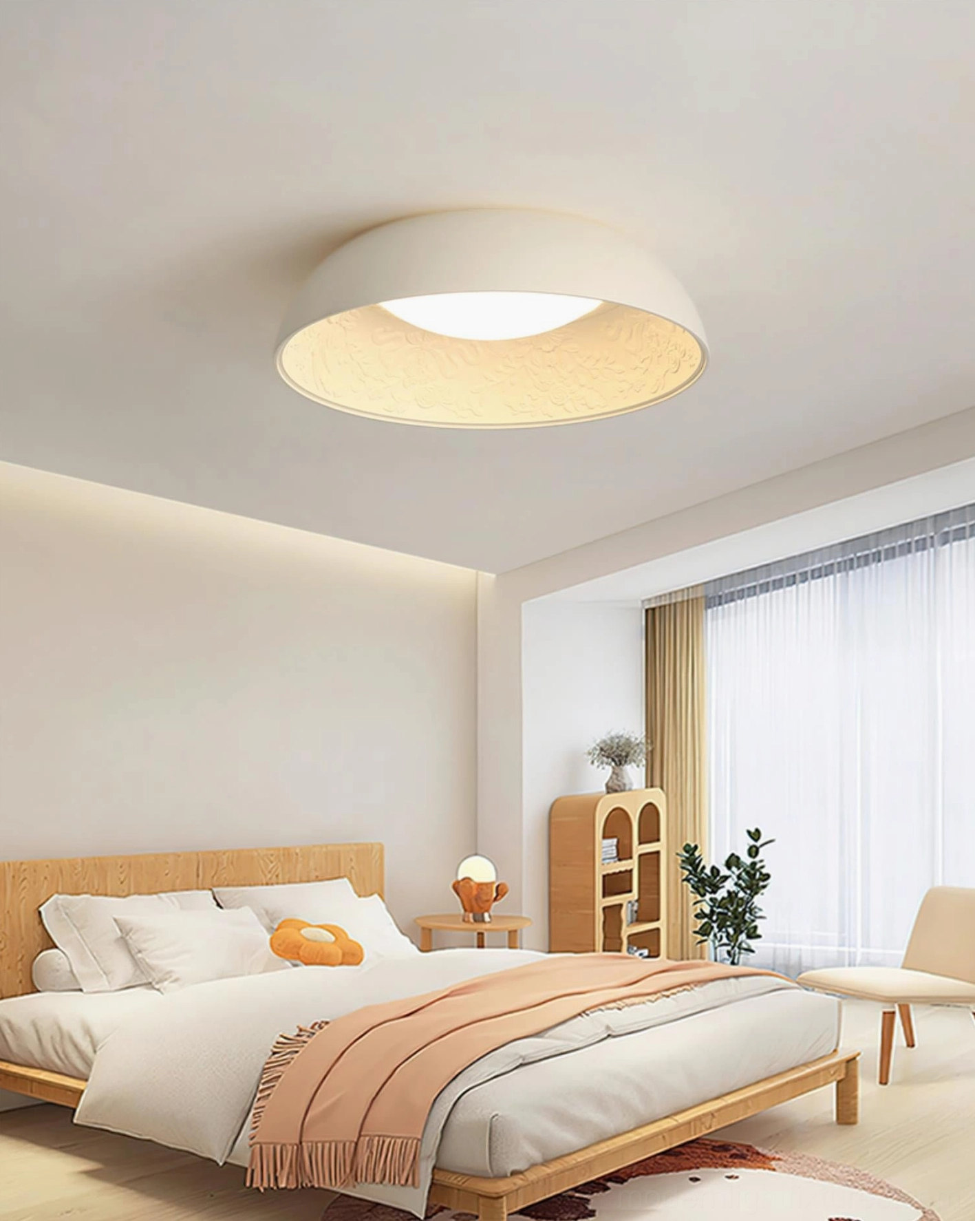 Lumina embossed ceiling light in warm bedroom with wooden bed and natural daylight from windows
