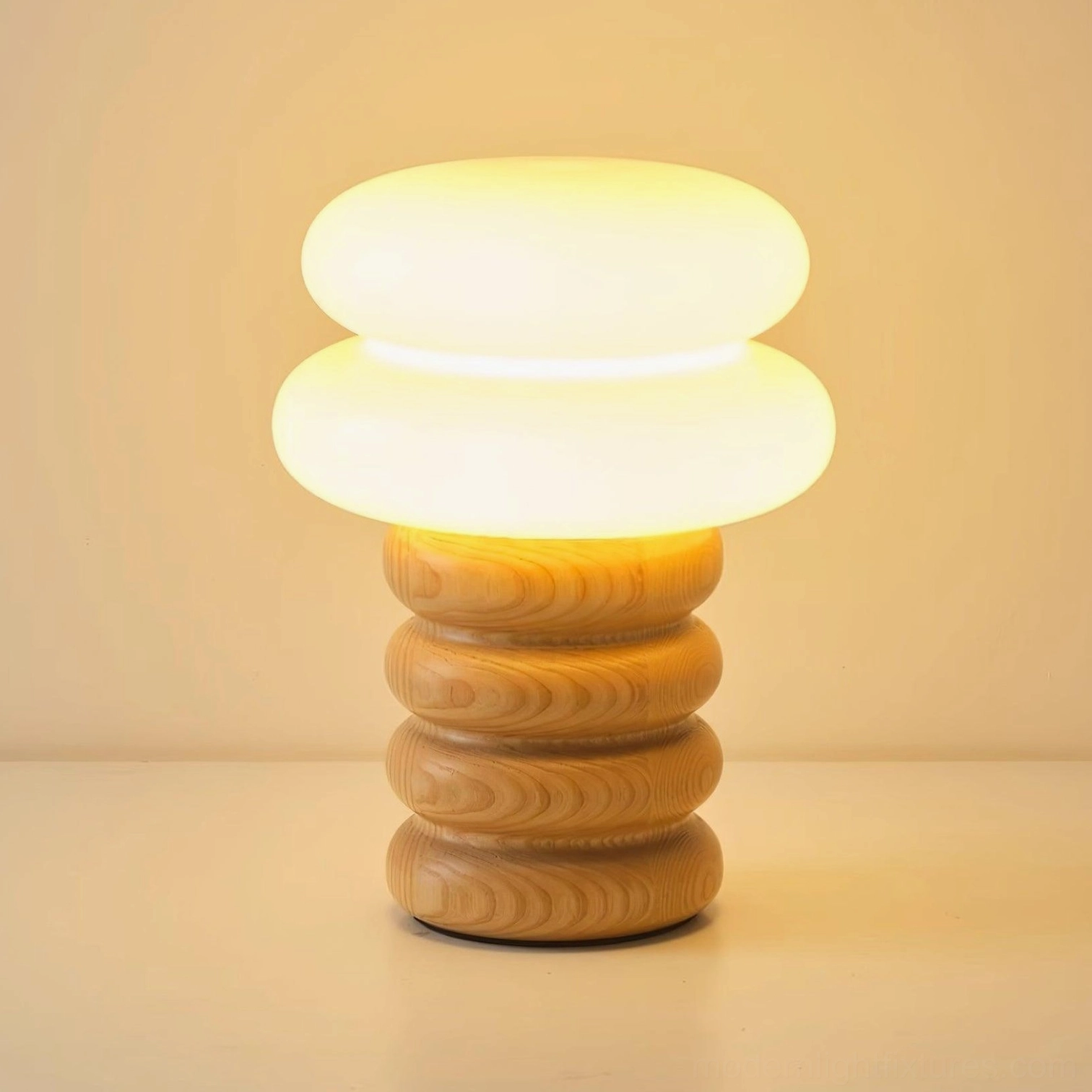Lumina modern table lamp three-quarter view illuminated warm light diffusion