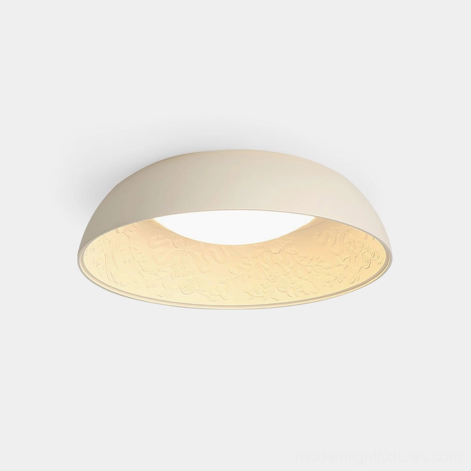 Lumina modern embossed flush mount ceiling light - cream resin fixture with circular minimalist design