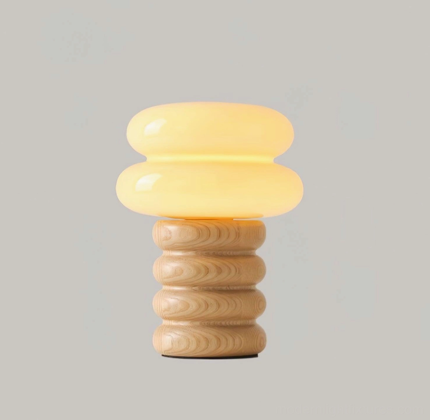 Japandi inspired ash wood table lamp creating warm ambient lighting in living space
