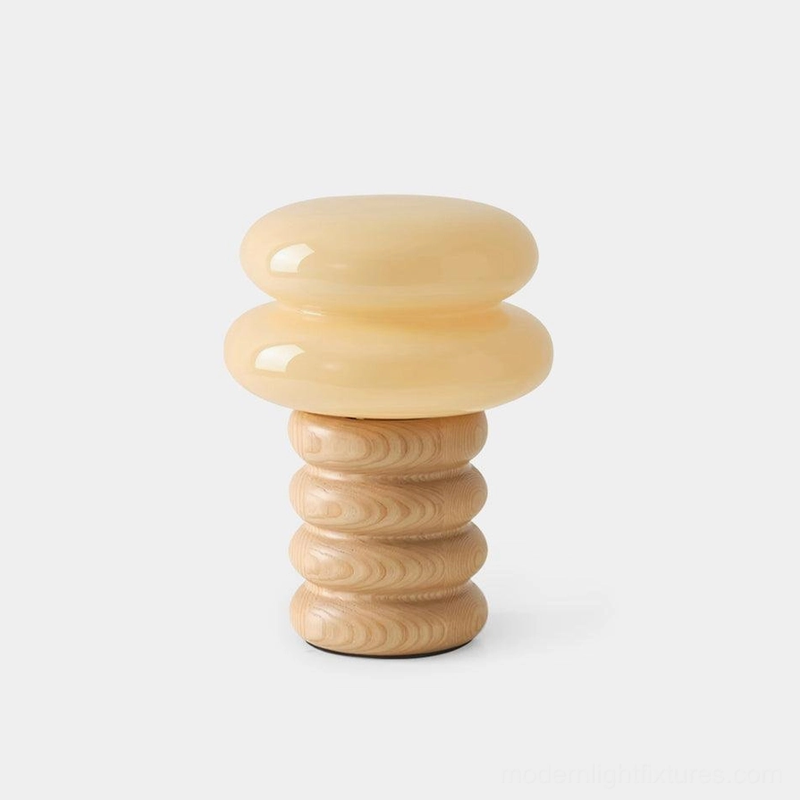 Lumina ash wood stacked table lamp front view with milky glass shade on white background