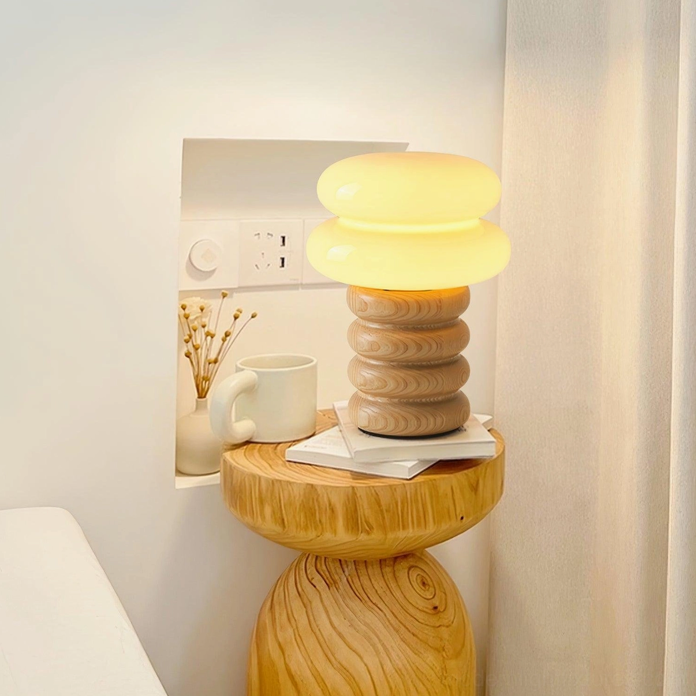Modern wooden stacked table lamp showing full design from elevated perspective