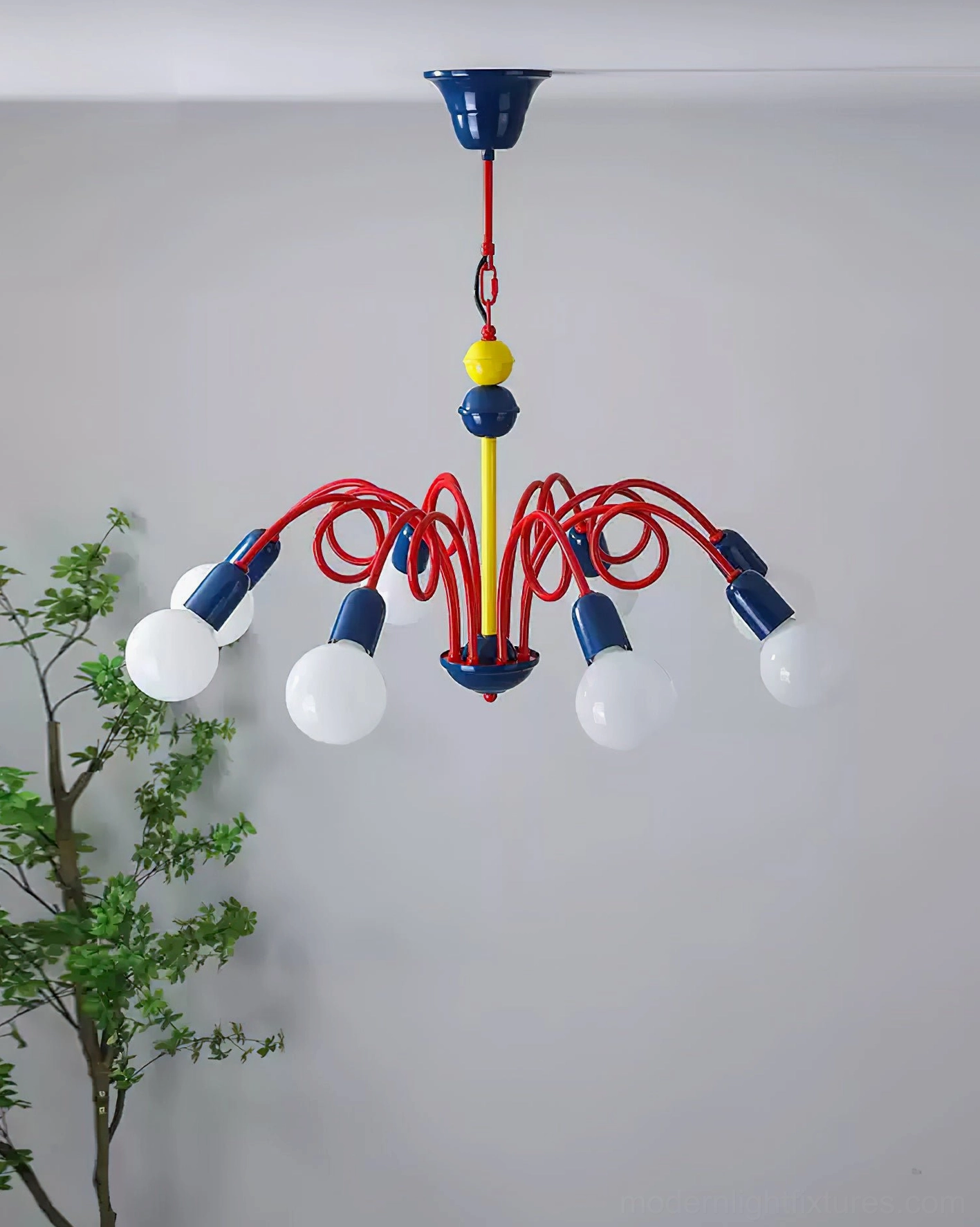 Luminosa 8-light chandelier full curved architecture with vibrant postmodern color blocking and tall plant