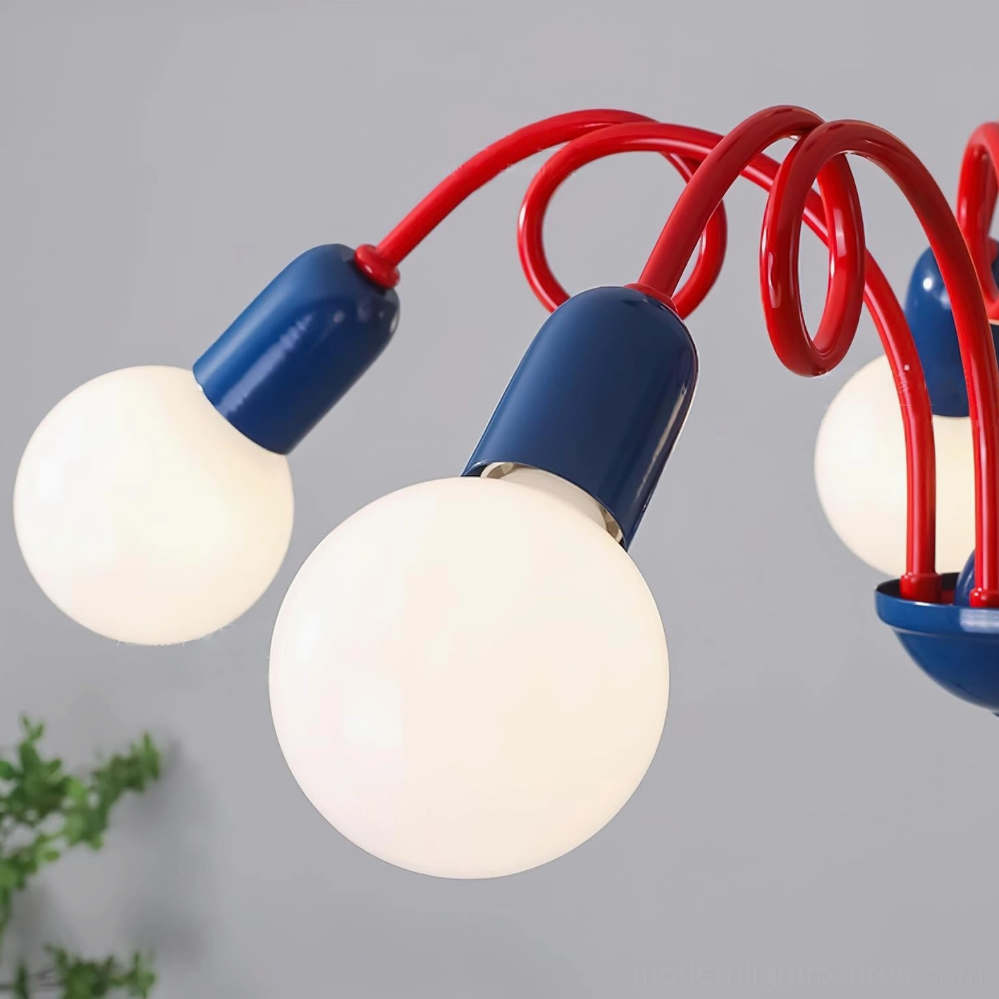 Luminosa modern chandelier close-up showcasing premium metal finish and color-block aesthetic quality