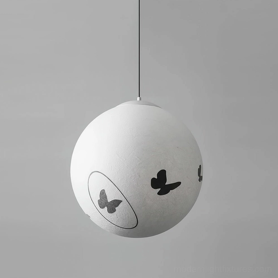 Luna Flutter modern pendant light in black and white color combination, sculptural spherical design with butterfly motifs