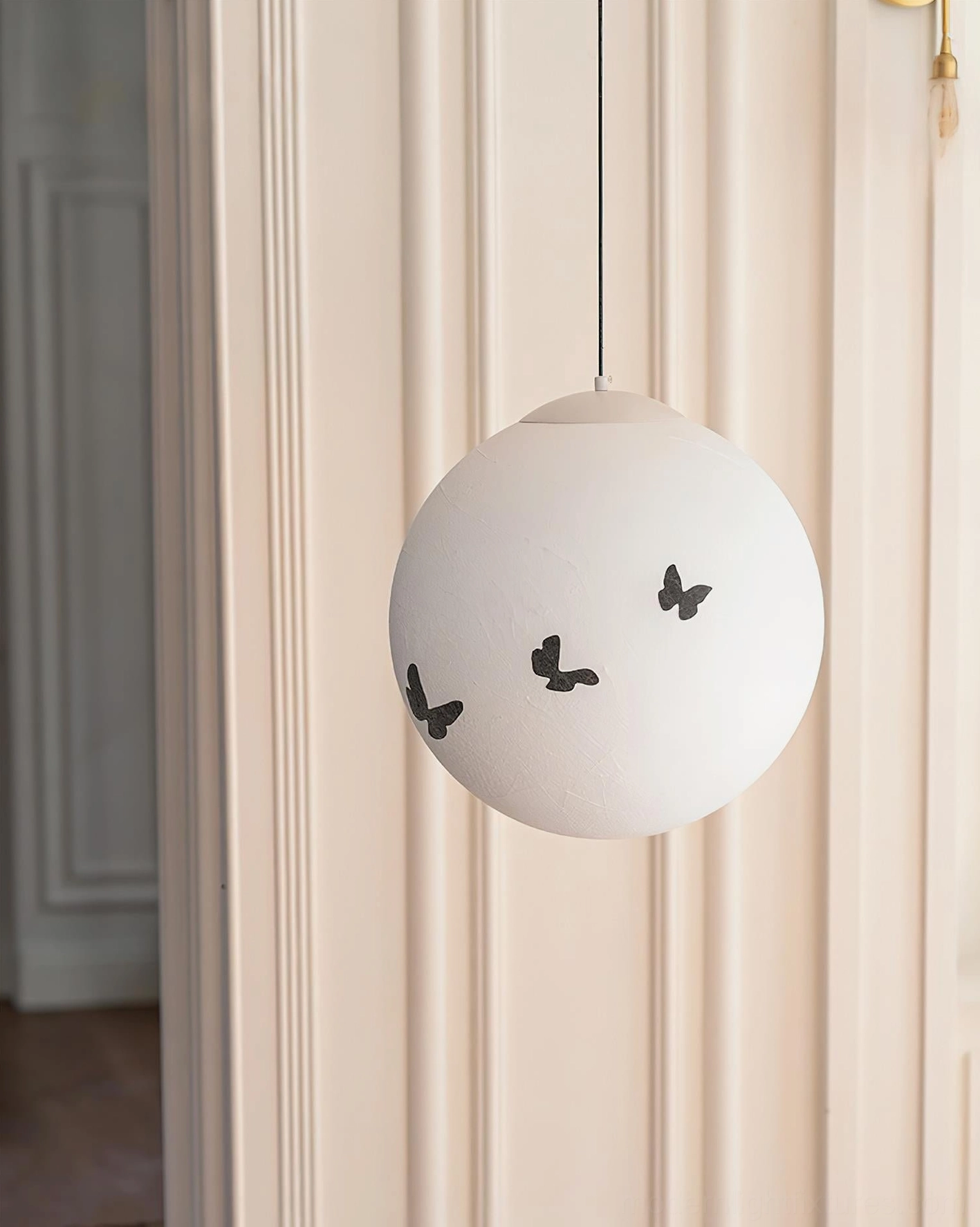 Luna Flutter pendant lamp matte white shade with black butterfly decals, minimalist modern design side view