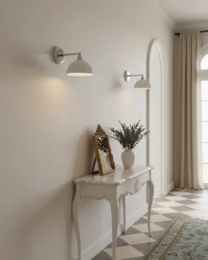 Pair of Luna Scallop wall sconces installed in elegant minimalist hallway, French-inspired interior design