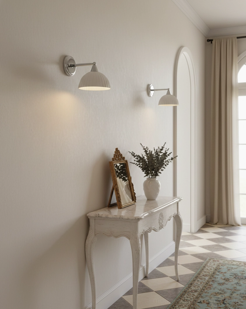 Pair of Luna Scallop wall sconces installed in elegant minimalist hallway, French-inspired interior design