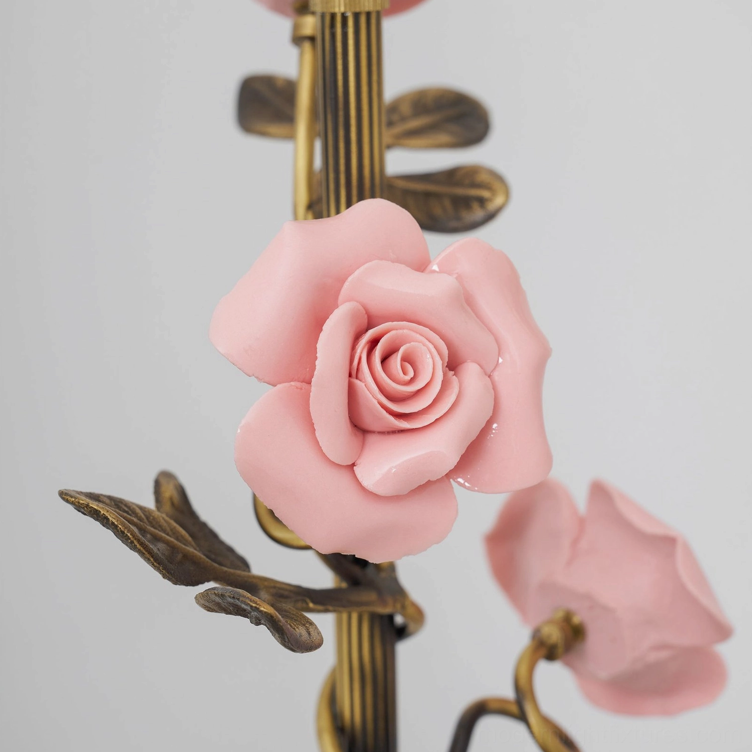 Lunafleur brass wall sconce pair flanking artwork in sophisticated gallery style interior