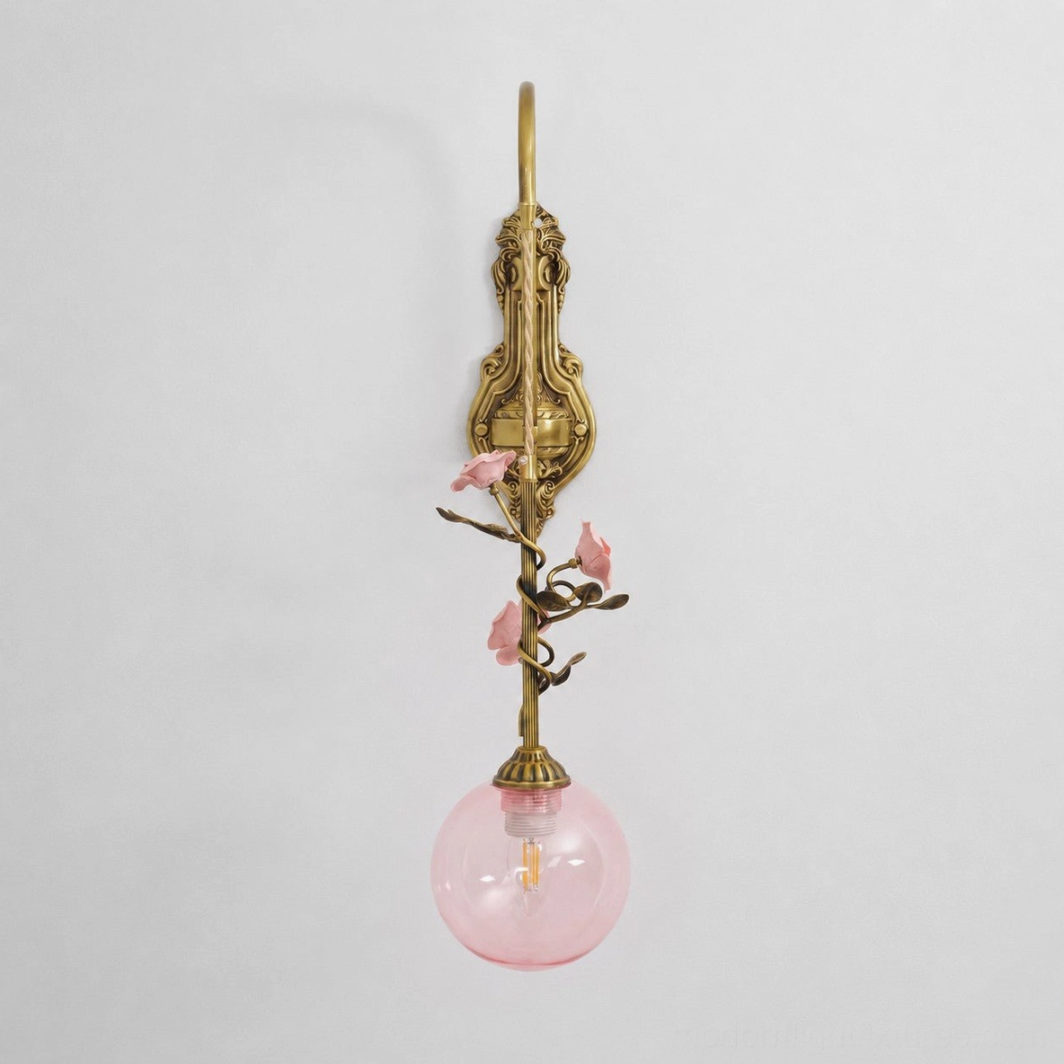 Lunafleur brass wall lamp showing patina development and aged finish characteristics