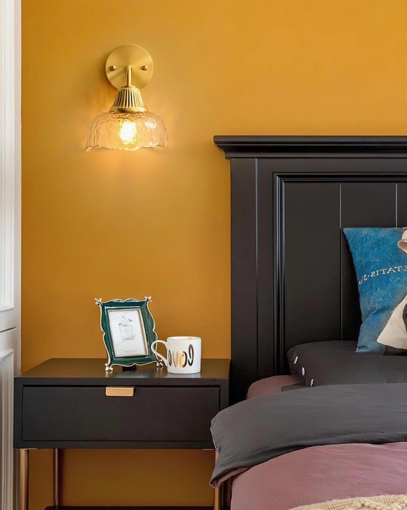 Lunara brass wall sconce bedroom styling mustard yellow accent wall contemporary bedside lighting