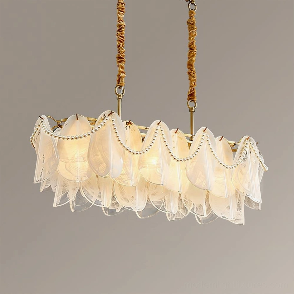 Lunaria linear petal chandelier 90cm length dual rod design suspended in modern dining space with gold finish