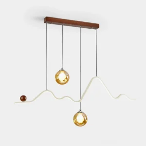 Lunaris wave LED chandelier frontal view with sculptural light bar and amber glass shades on walnut ceiling mount