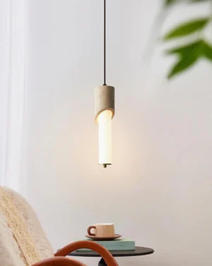 Lunaro pendant light warm glow cozy living room with plant decor
