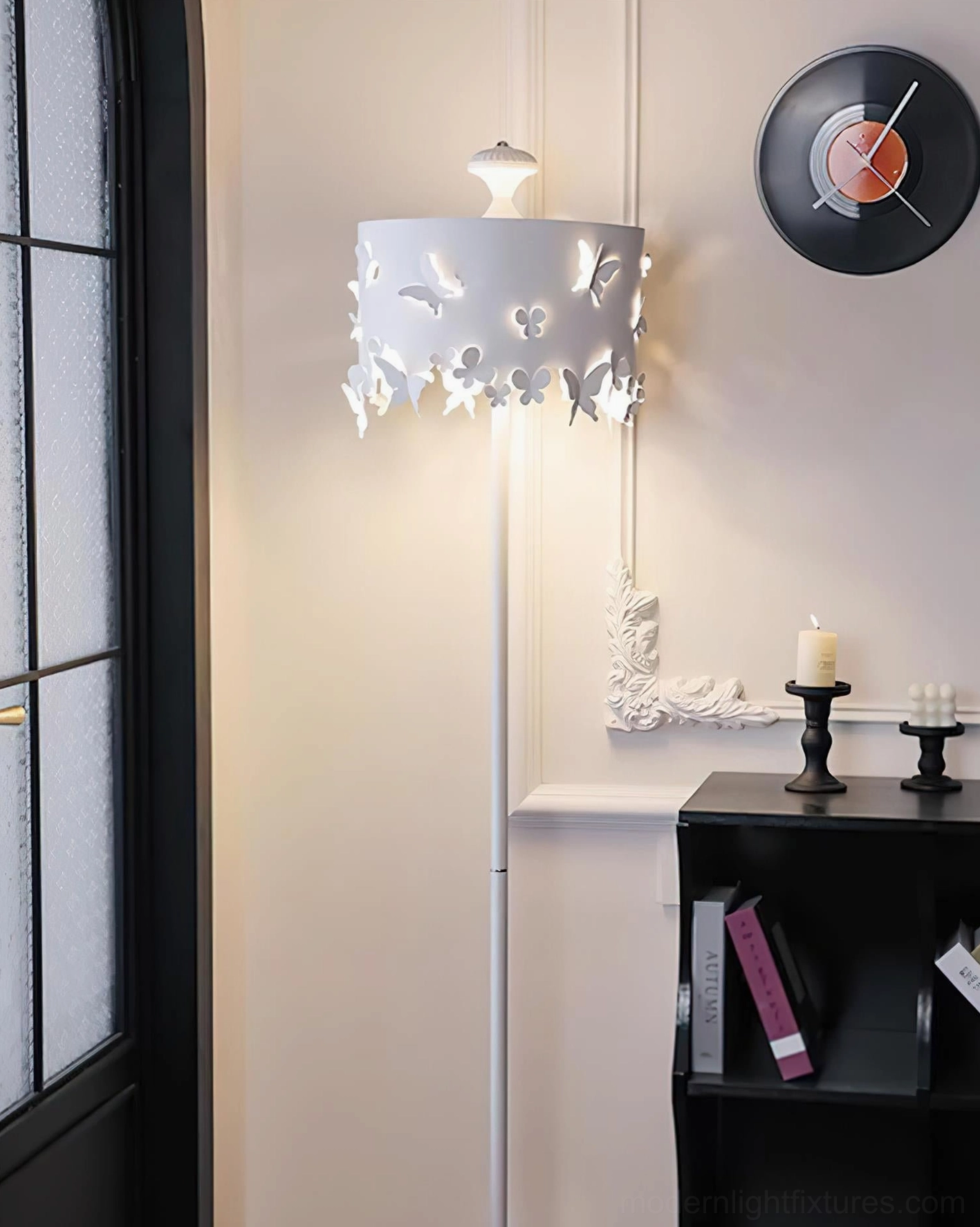 Lunefly butterfly cut-out floor lamp alternative angle view showing sculptural design and minimalist stand construction
