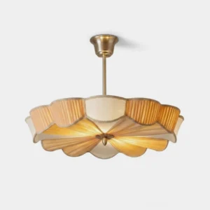 Lunessa pleated scalloped fabric semi-flush ceiling light with brass-tone metal canopy and cream champagne pleated shade, front view against studio background