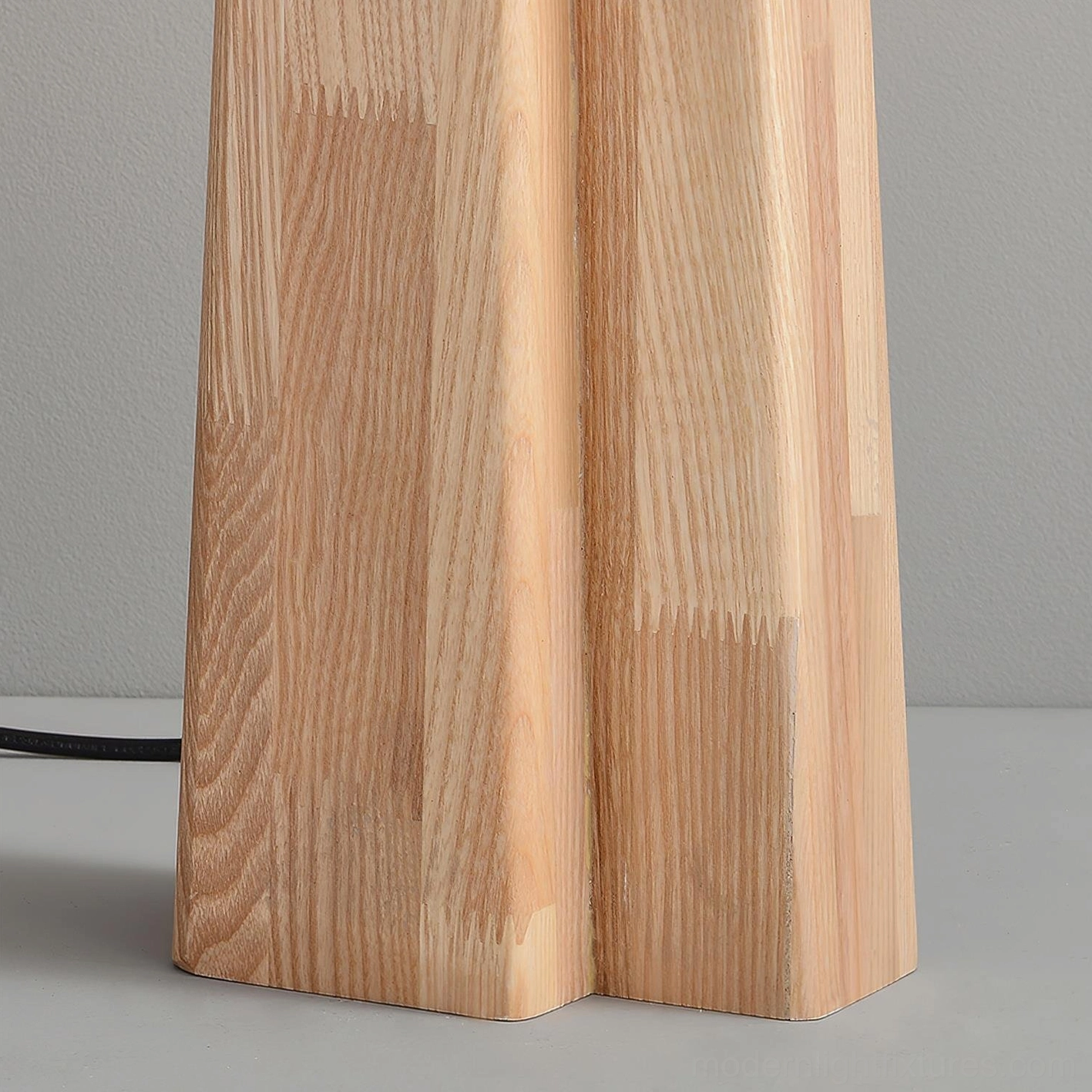 Lunet table lamp front direct view displaying clean geometric lines and wood grain texture details