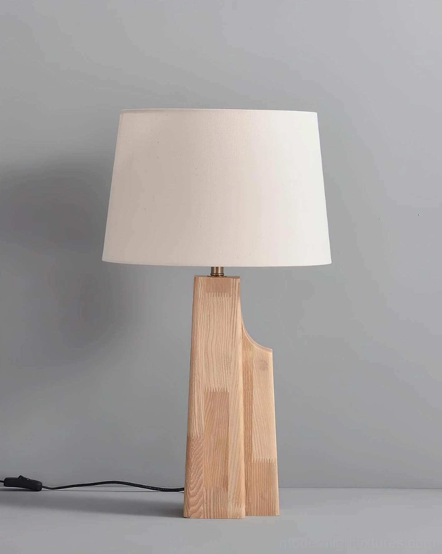 Lunet table lamp close-up of metal fixture and polished connector between wooden base and fabric shade
