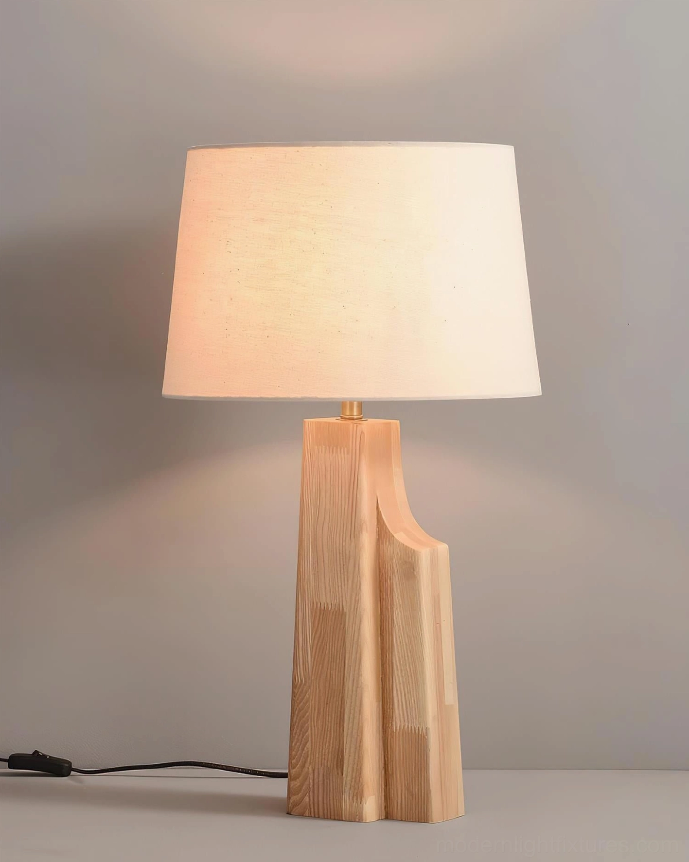 Lunet minimalist table lamp three-quarter studio view showing natural wood construction and design