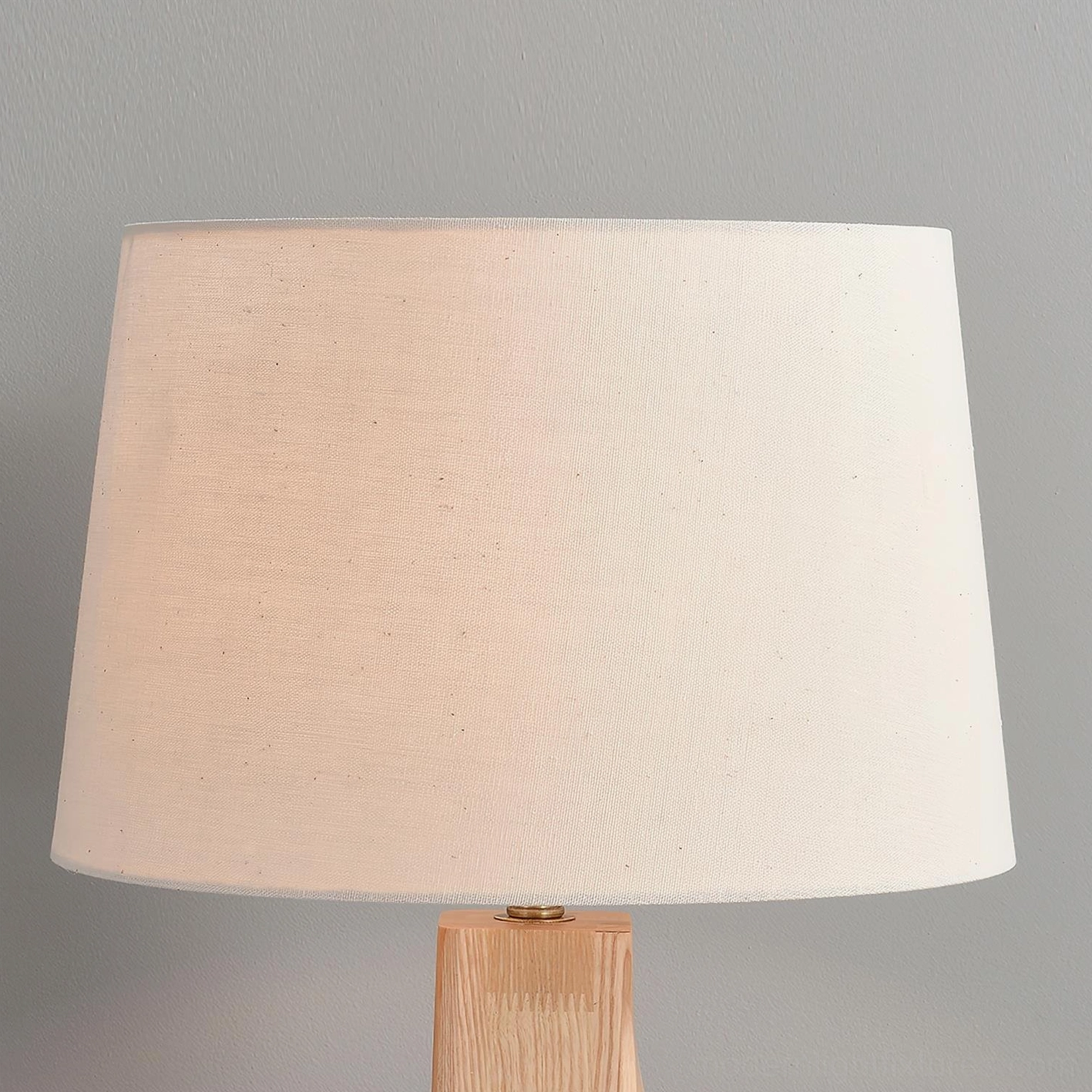 Lunet table lamp showcase featuring sculptural stepped base and contemporary minimalist aesthetic