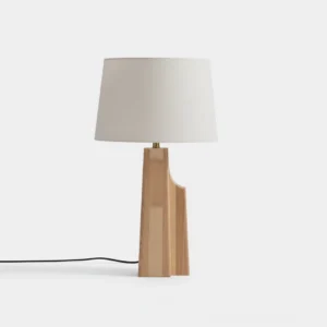 Lunet minimalist table lamp front view with asymmetrical wood base and soft off-white fabric shade