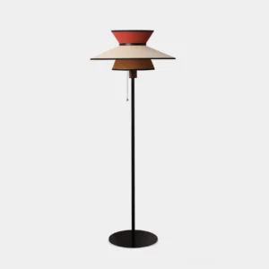 Lunetra sculptural floor lamp front view with layered conical fabric shades in orange-red, light brown, and cream tones on matte black metal stand