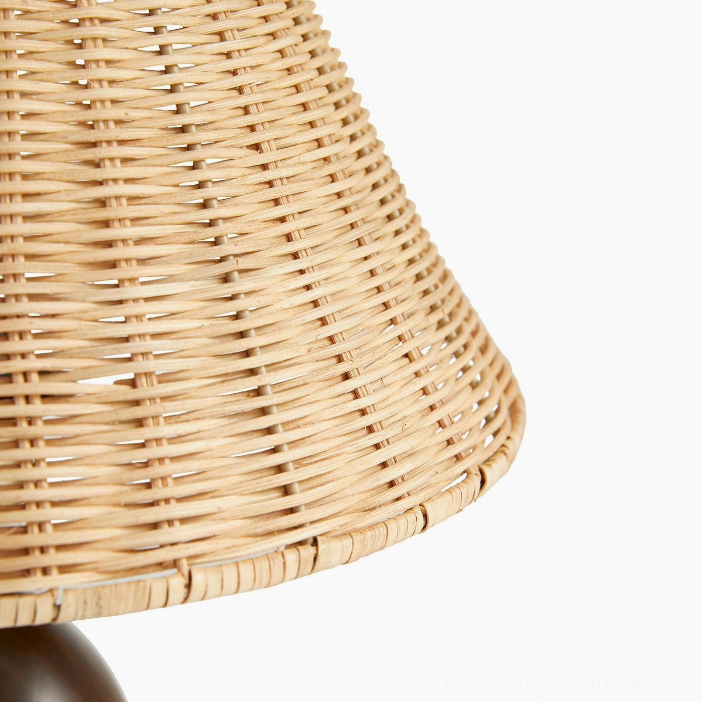 Close-up detail of Lunora hand-woven rattan shade showing tapered conical weave texture