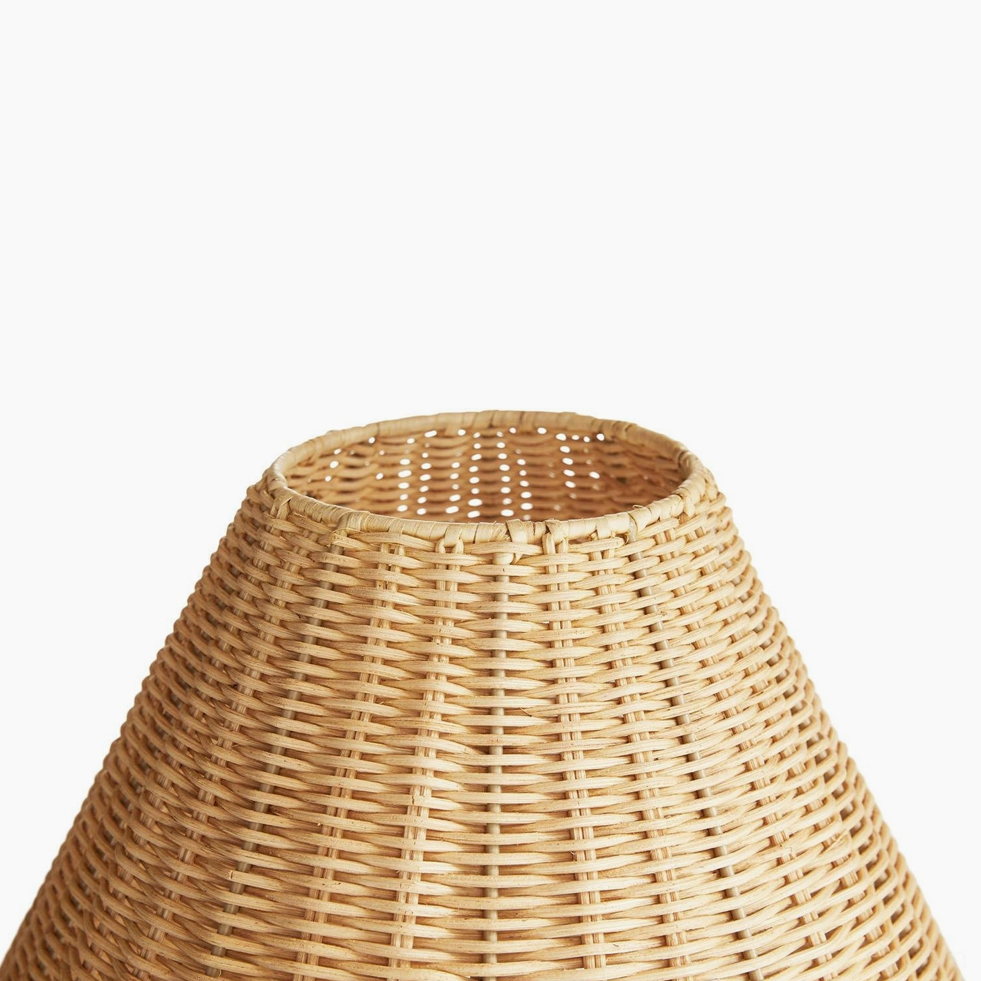 Lunora lampshade interior detail showing open woven rattan structure and light filtering