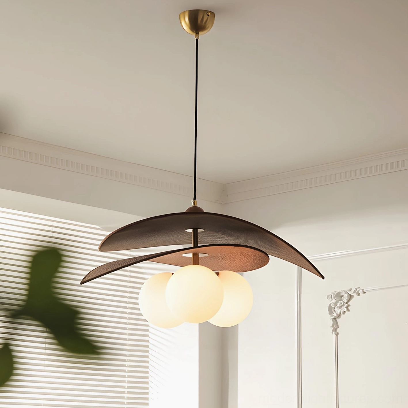 Lunova pendant light in deep Brown finish with sculptural layered disc shade, showing warm wood tones and metal accents