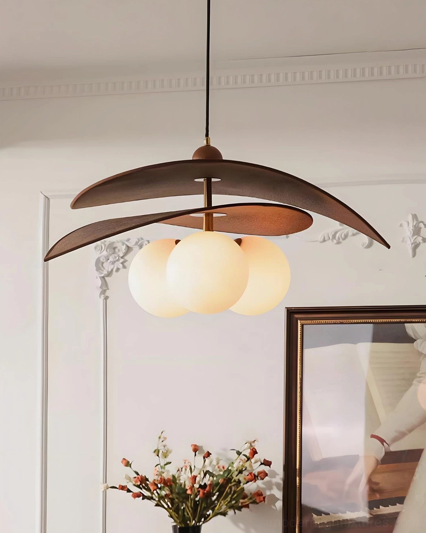 Lunova pendant lamp mounted in contemporary living space with minimalist decor and warm lighting ambiance